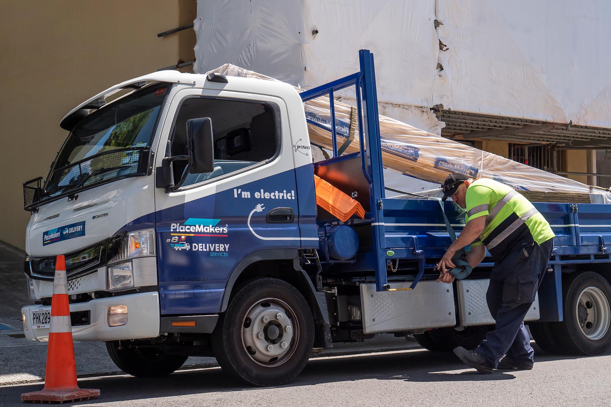 PlaceMakers FUSO eCanter light-duty truck in action 